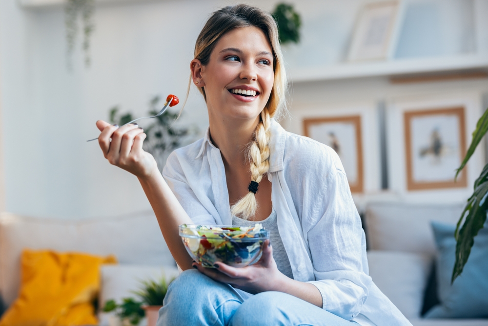 woman eating healthy salad
